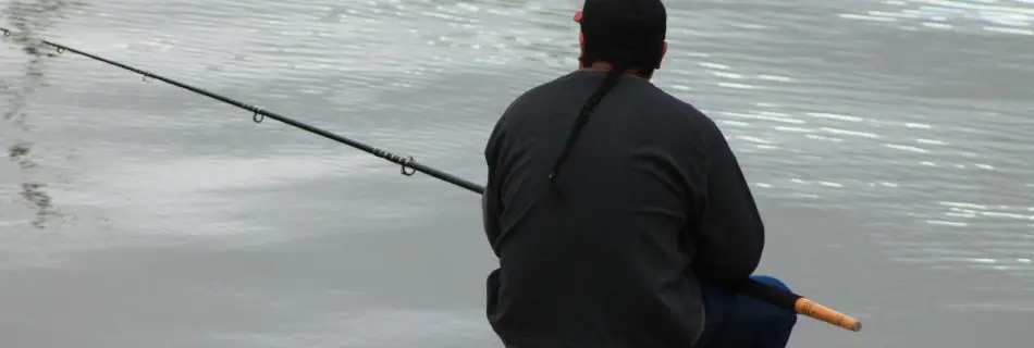 Angler am see am Steg